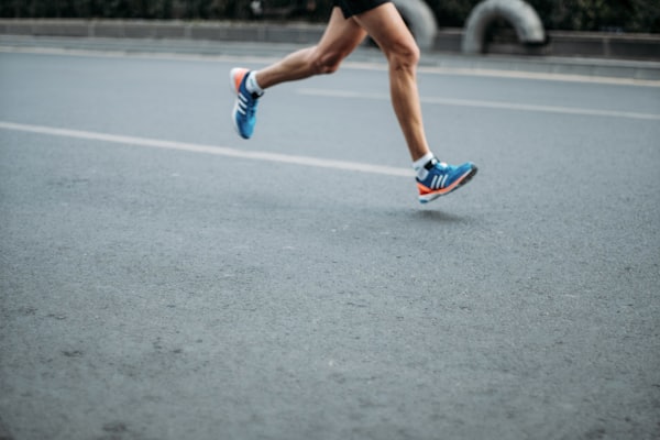Person running outdoors on a trail